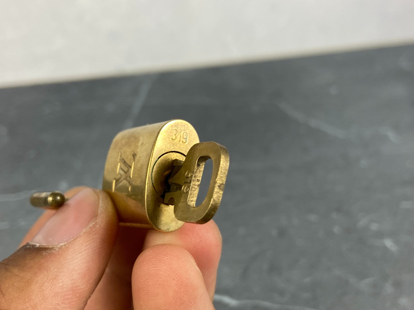 Louis Vuitton Lock Gold Tone No. 319