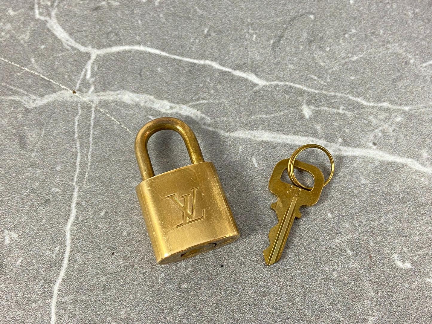 Louis Vuitton Lock Gold Tone No. 313