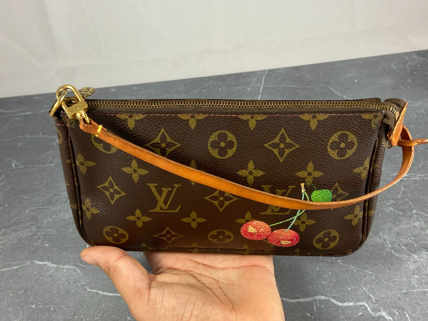 Pochette accessoire leather handbag Louis Vuitton Multicolour in Leather -  30917128