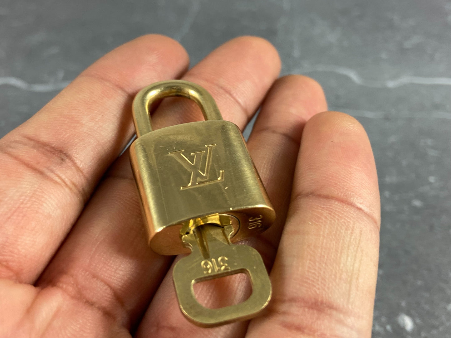 Louis Vuitton Lock Gold Tone No. 316