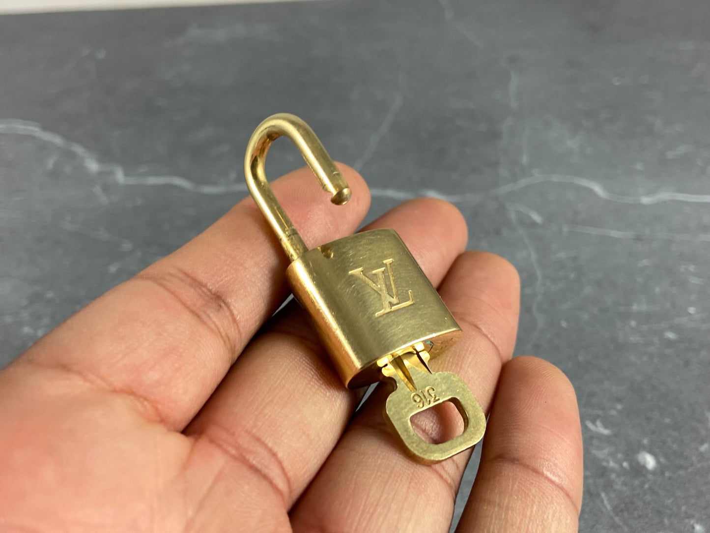 Louis Vuitton Lock Gold Tone No. 316